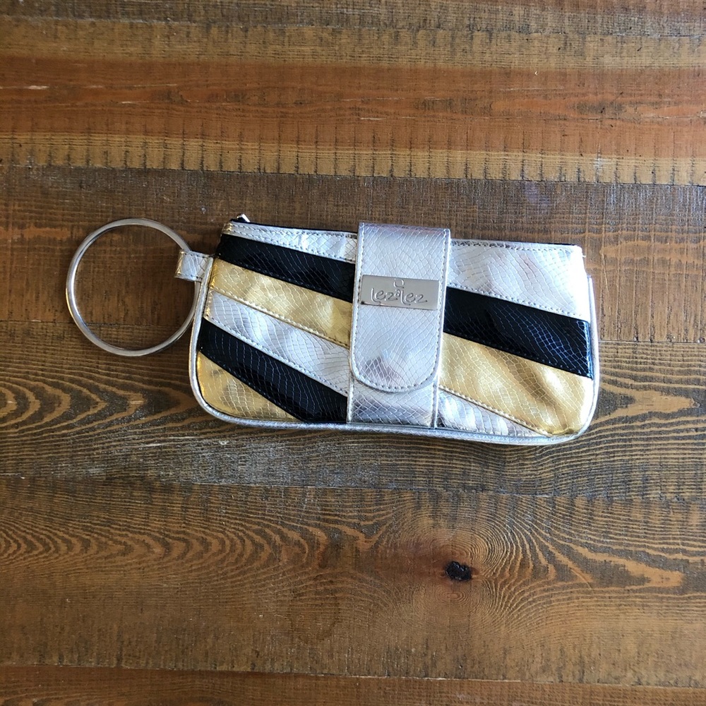 Cocktail leather clutch in silver, gold and black.